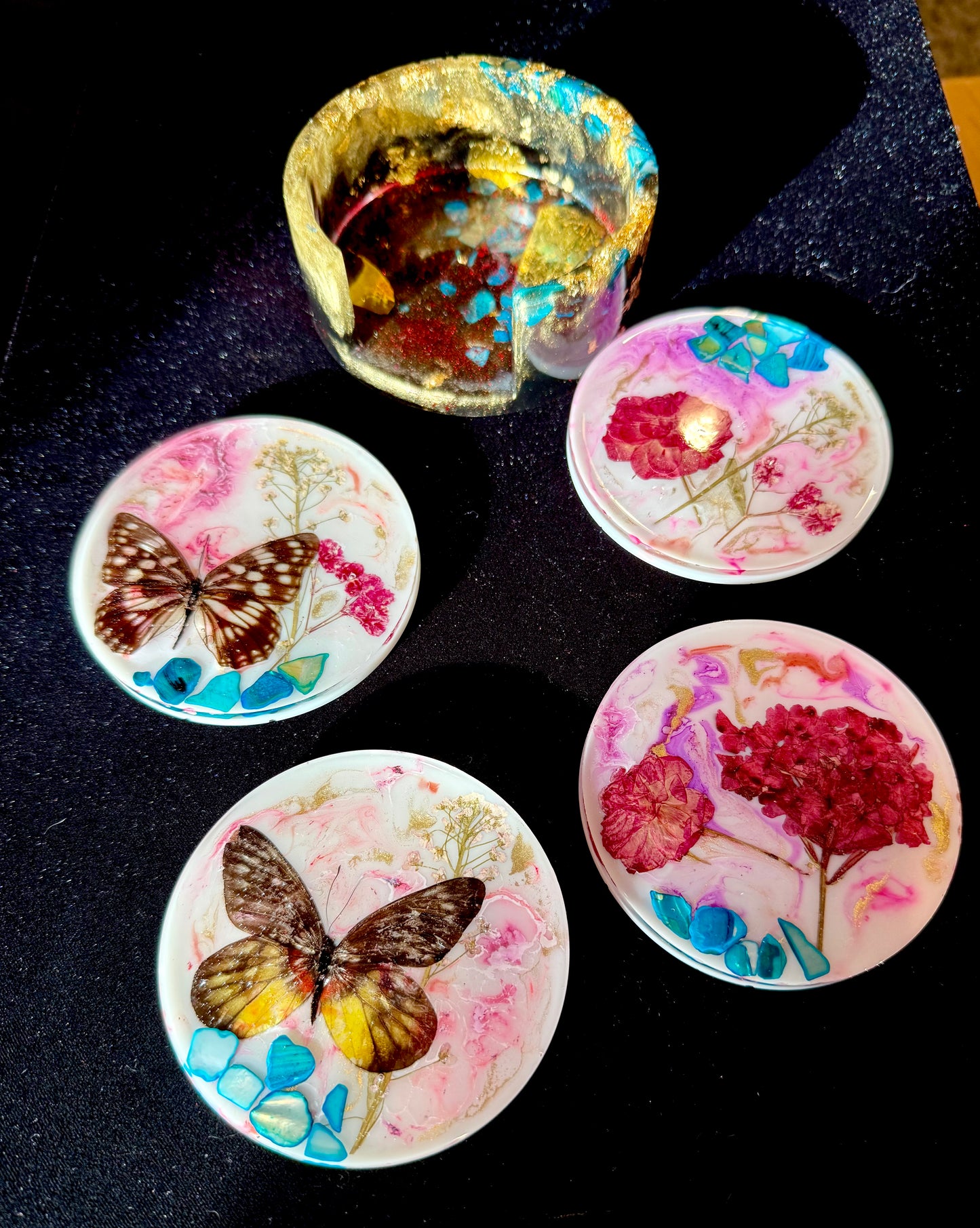 Decorative coasters with butterfly and floral designs