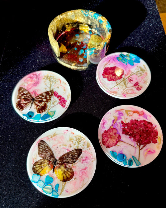 Decorative coasters with butterfly and floral designs